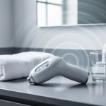 “At-home shockwave therapy device on a bathroom counter with clean, minimal accessories suggesting safe and discreet ED treatment.”